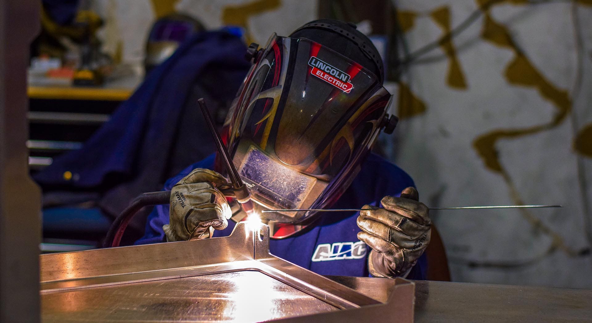 AJAC Youth Apprentice welding on the job