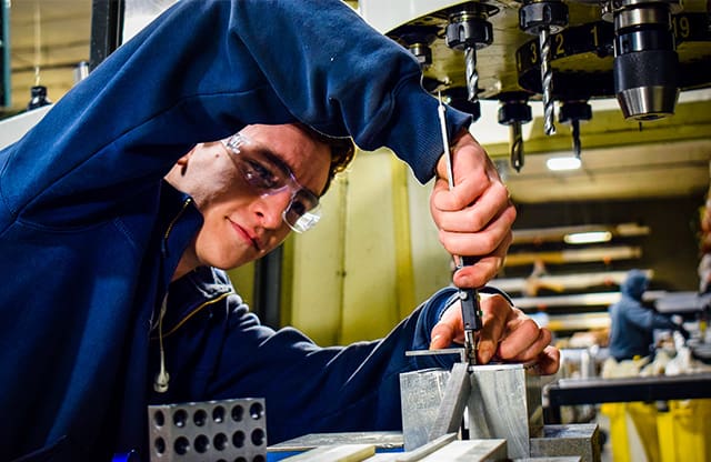 Machinist precision measuring in training