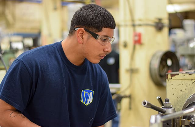 Juvenile Rehabilitation student machining in Manufacturing Academy program