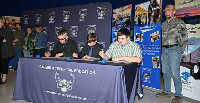 Elma Youth Apprentices signing their apprenticeship agreements at Signing Day