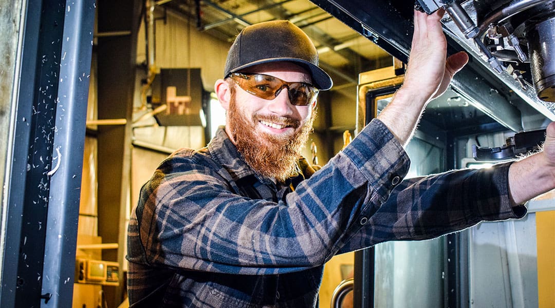 An AJAC Machinist apprentice working at a machine shop in Arlington, Washington.