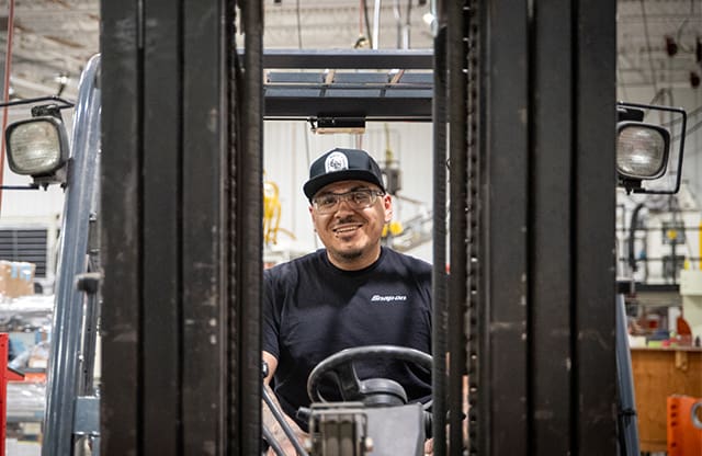 An AJAC apprentice operates a forklift at TSL (Thermoforming Systems) in Union Gap, Washington.