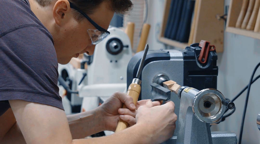 a student at the Lacey MakerSpace used a machine