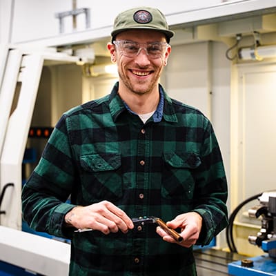 Dillon Jackson graduated AJAC's Manufacturing Academy and now works as a machinist at JD Ott in Seattle.