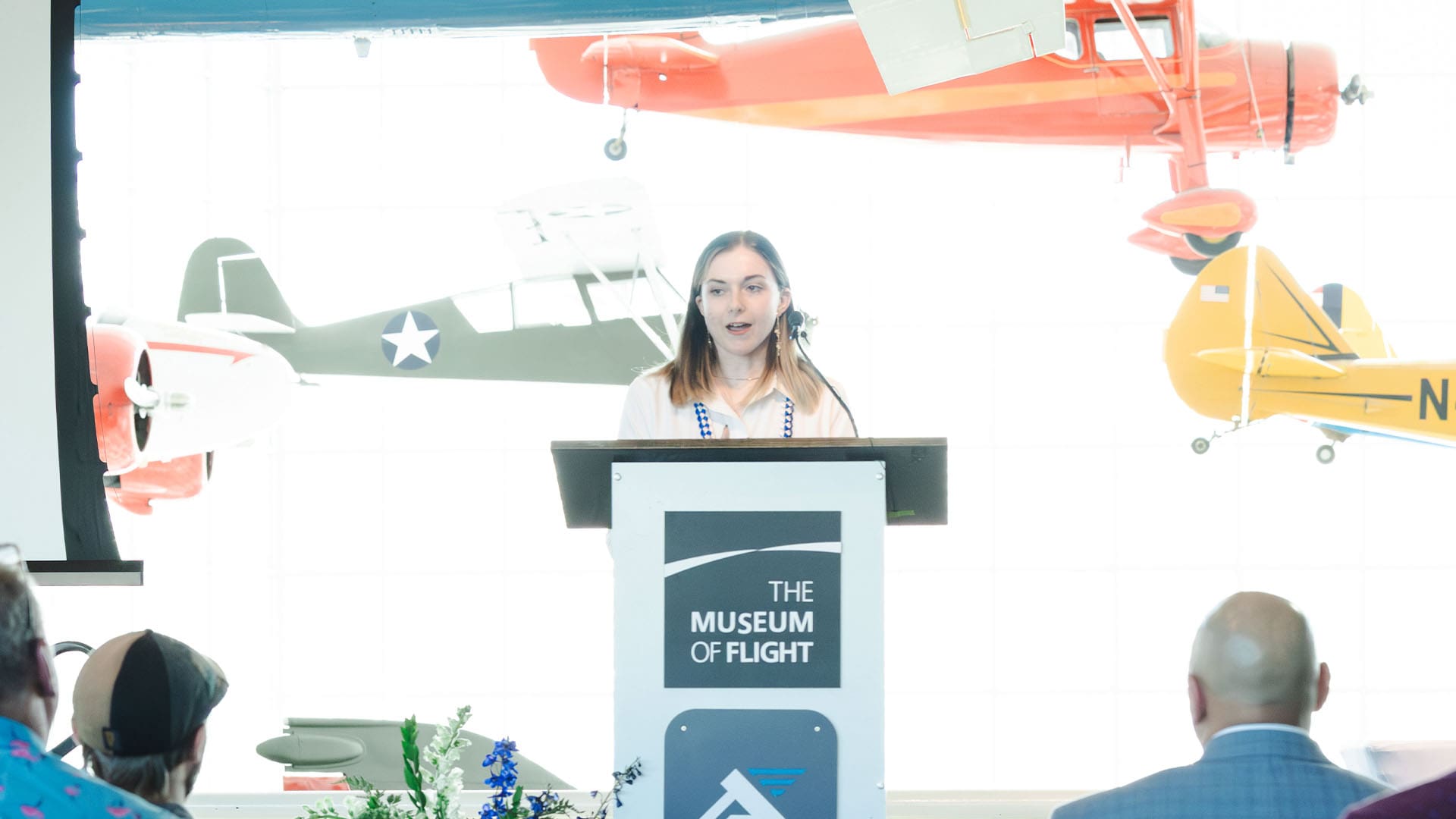 Kayle Arneson, a member of AJAC's graduating class of 2026 delivers her speech on June 12th at The Museum of Flight.